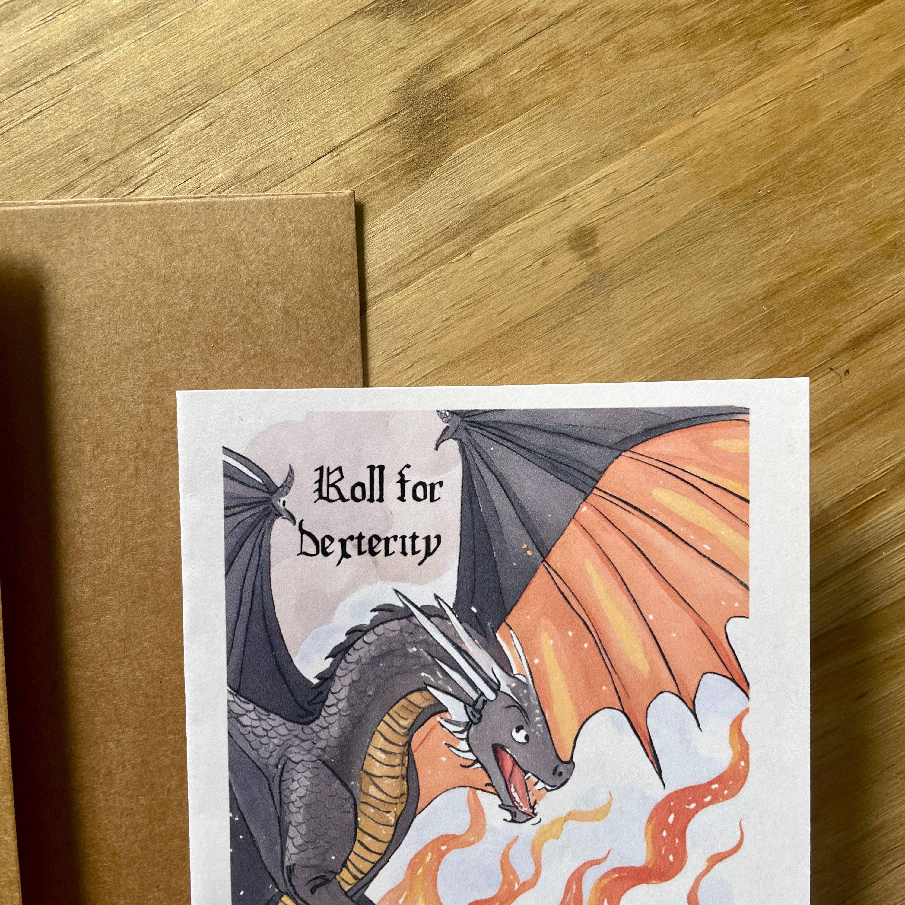 Medieval Knight and Dragon Encouragement Card featuring a black dragon with orange wings and flames on matte card stock.