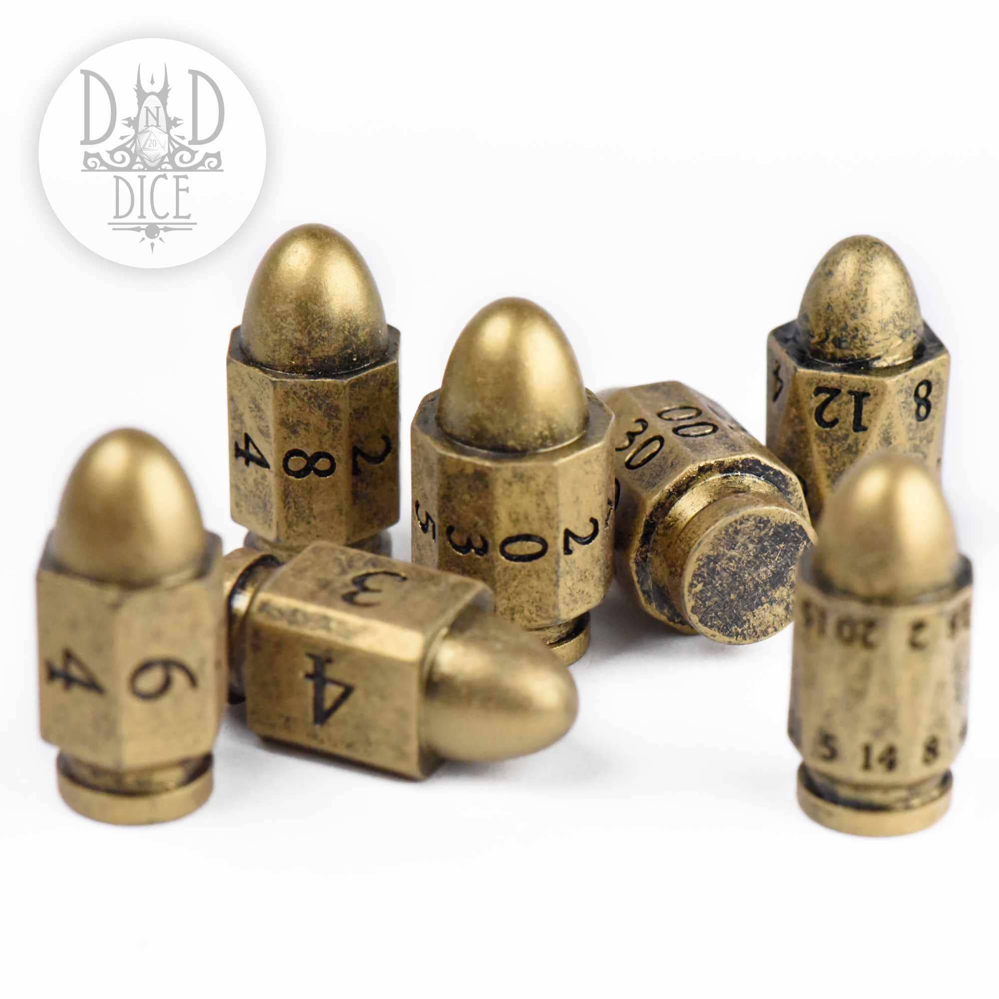 Six Top Brass bullet-shaped dice with engraved numbers.