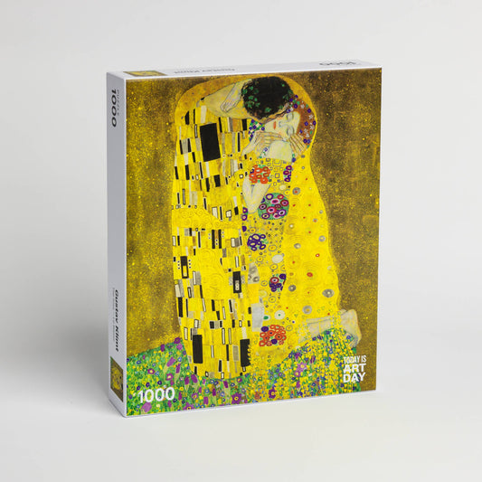 The Puzzle - Gustav Klimt - Kiss 1000-piece box with his gold and colorful painting on the cover.