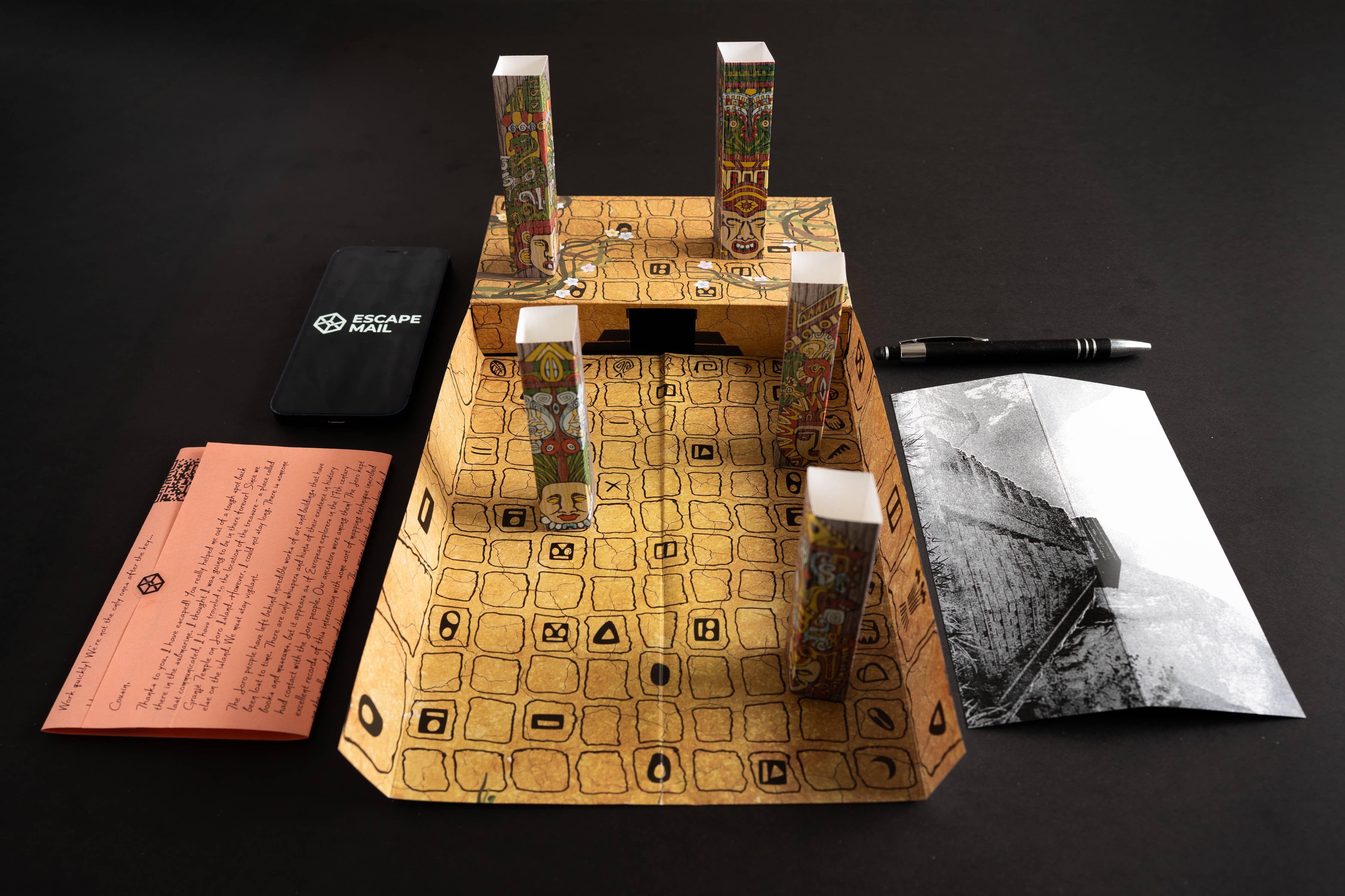 The Family Secrets Series Episode 3 Ancient Mysteries 3D paper puzzle with pen, phone, letter, and photo pieces.