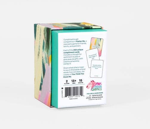 Flatter Me: A Compliment Battle Card Game box by Pink Tiger Games with details and sample cards shown on the back.