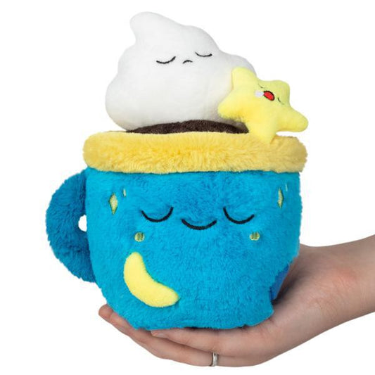 Snacker-sized Alter Ego Coffee plush in the shape of a blue mug with smiling face, yellow moon, star, and cloud.
