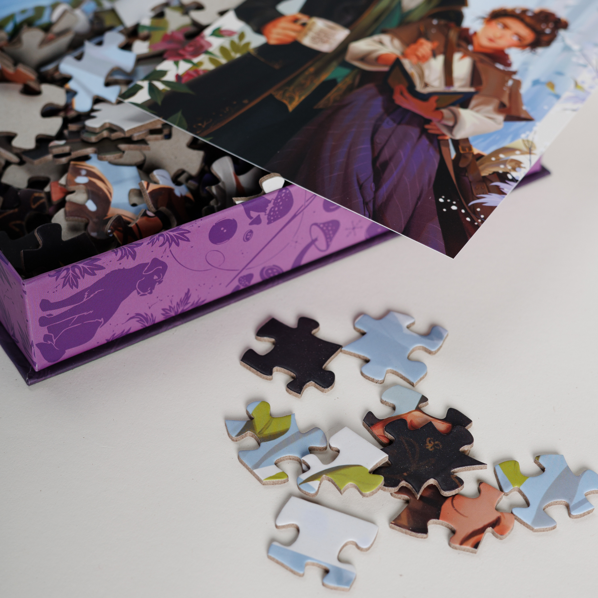 Faerie Fieldwork Keepsake Puzzle | Emily Wilde box and puzzle pieces displayed.