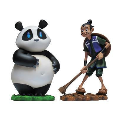 Takenoko board game figurines: a cartoon panda and a man with a shovel.