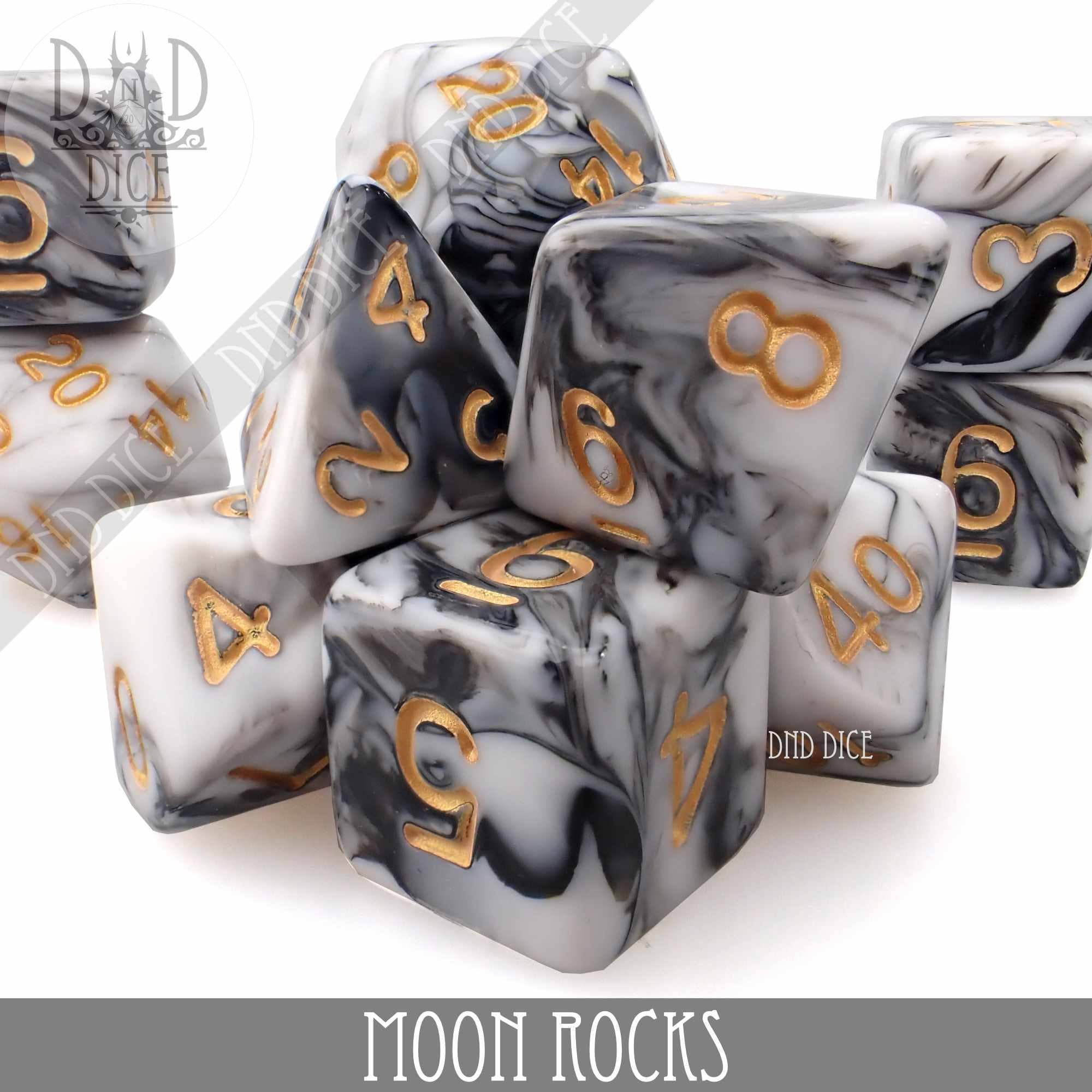 Black and white marbled polyhedral dice with gold numbers in bottles labeled Moon Rocks 7 or 11.