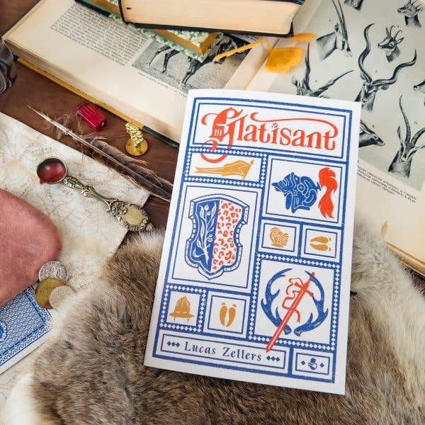 Glatisant solo journaling game book with a white cover, featuring red and blue shield and helmet illustrations.