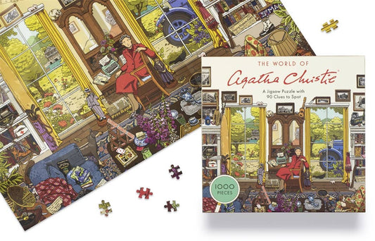 World of Agatha Christie 1000 Piece Puzzle with box and loose pieces on a white surface.