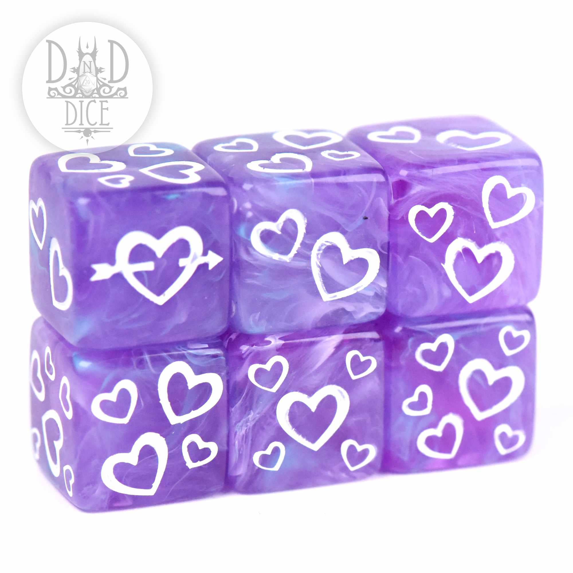 Emotional Damage 4D6 set: six purple 16mm D6 dice with white hearts; DnD Dice logo present.