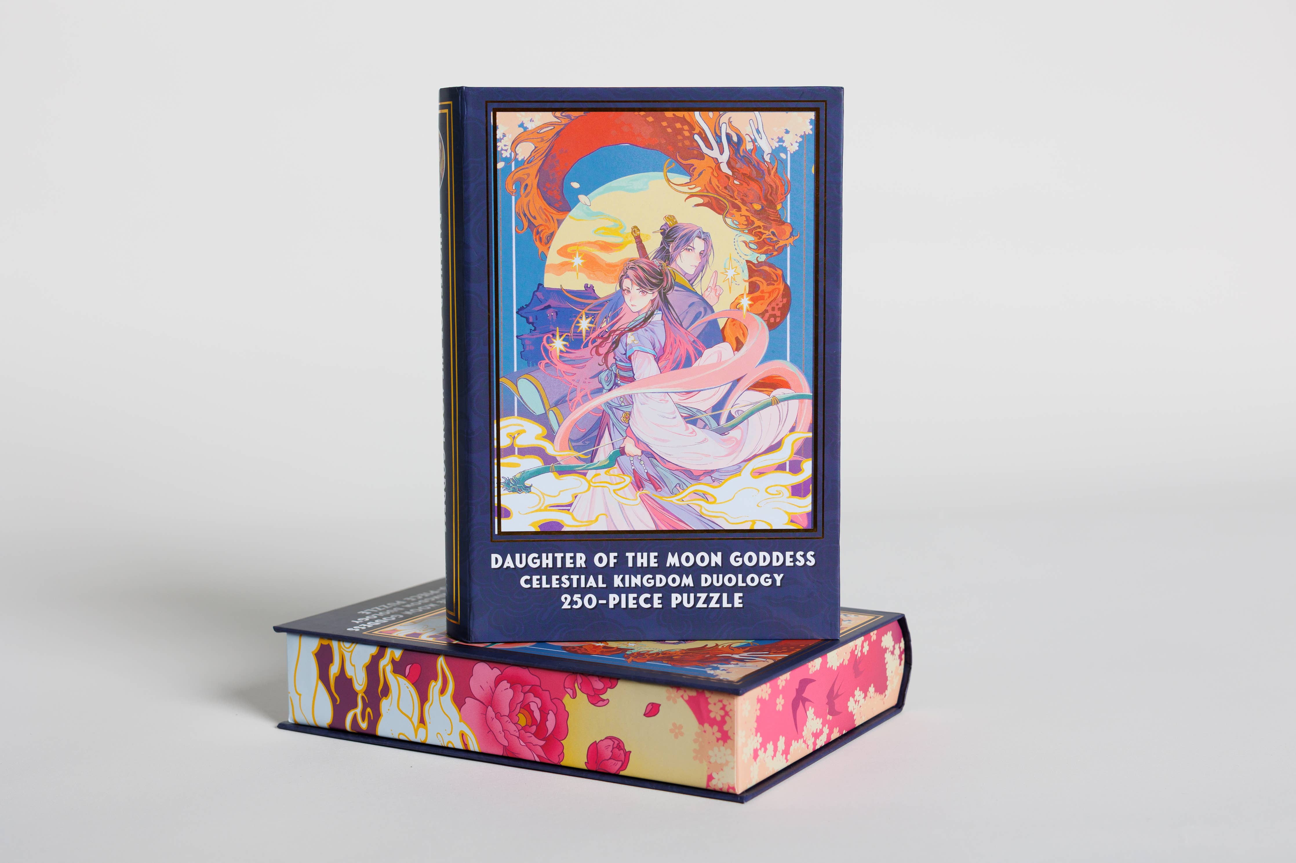 The Daughter of the Moon Goddess Keepsake Puzzle, 250 pieces, in a book-shaped box with colorful artwork.