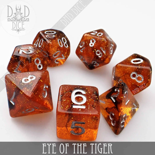 Eye of the Tiger set of 7 translucent orange resin dice with silver numbers for DND games.