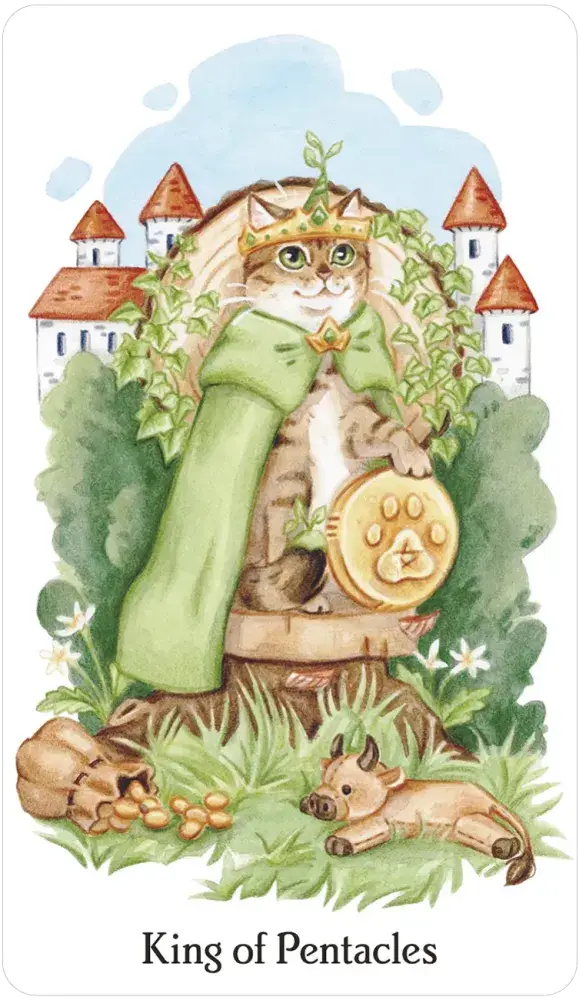 Caticorn Tarot card deck featuring a cat in a green cape with a gold coin, castles, and a bull.