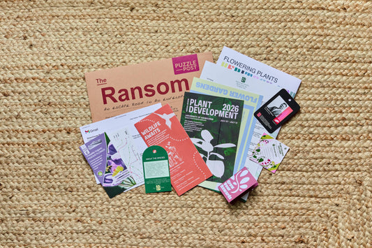 Escape Room | Puzzle Game | Board Game | The Ransom components including booklets, cards, and puzzles.