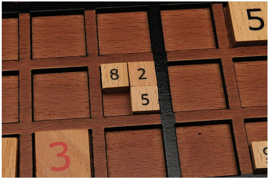 11.5 Walnut Stain Wooden Sudoku Board with empty and numbered squares; number tiles 8, 2, and 5 are placed on it.
