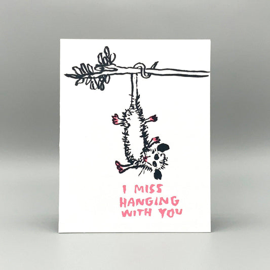 Letterpress card featuring a possum and the text I MISS HANGING WITH YOU, with a recycled kraft envelope.