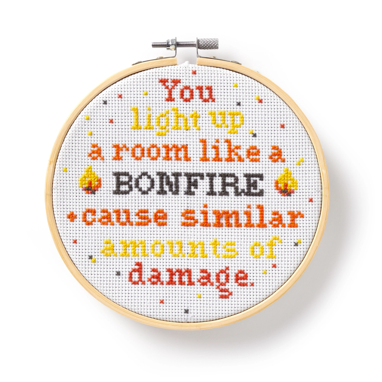 You Light Up A Room Cross Stitch Kit for beginners with text: You light up a room like a BONFIRE cause similar damage.