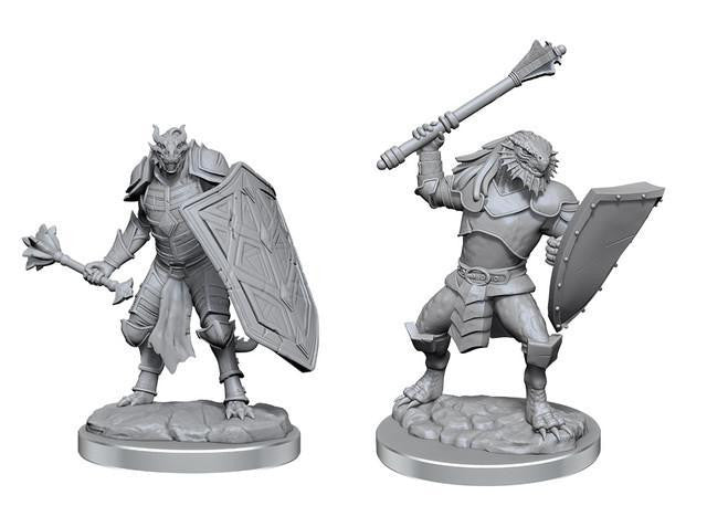 Two D&D: NMU: Dragon Clerics W18 miniatures with shields and maces on rocky bases.