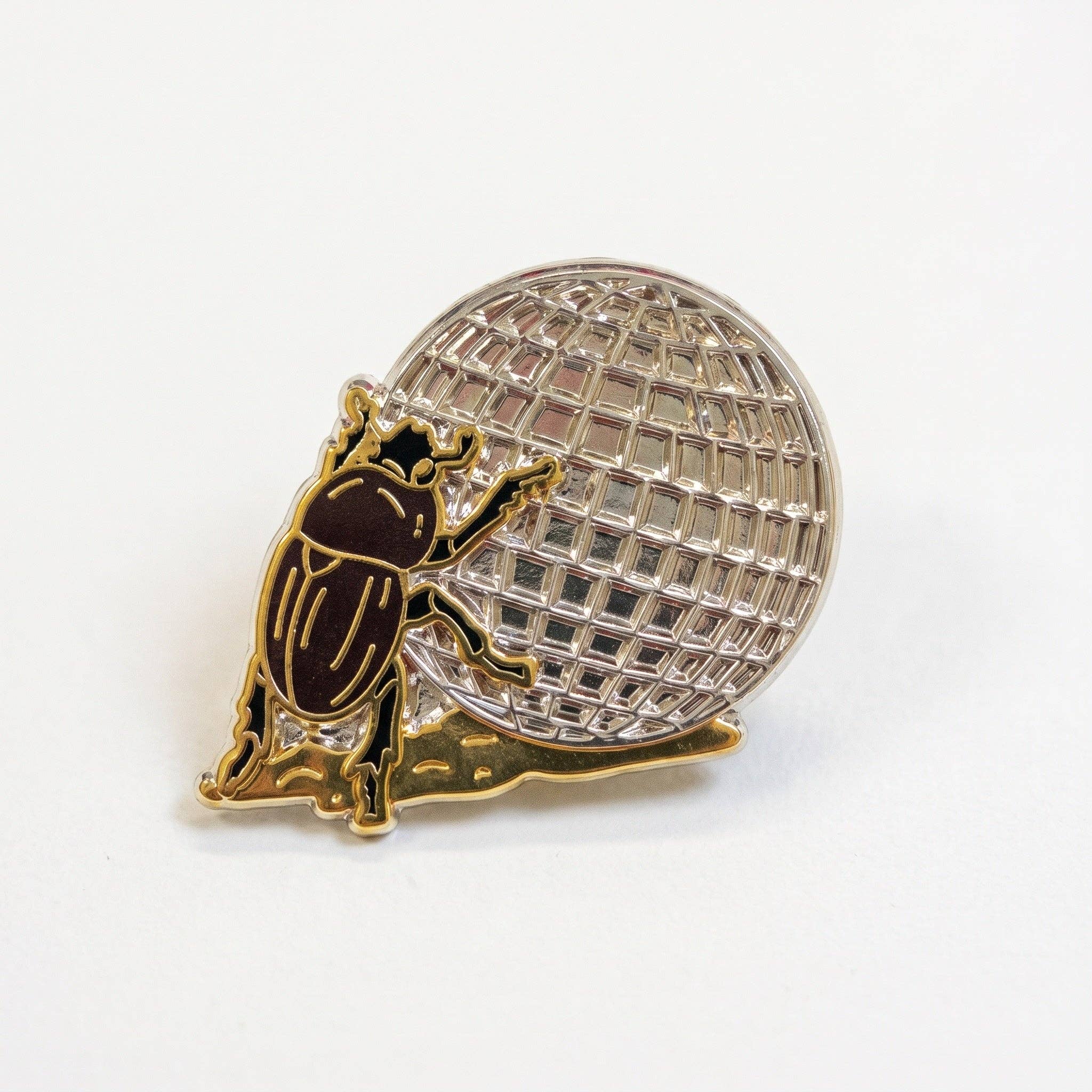 Gold-plated hard enamel disco beetle pin pushing a silver disco ball.