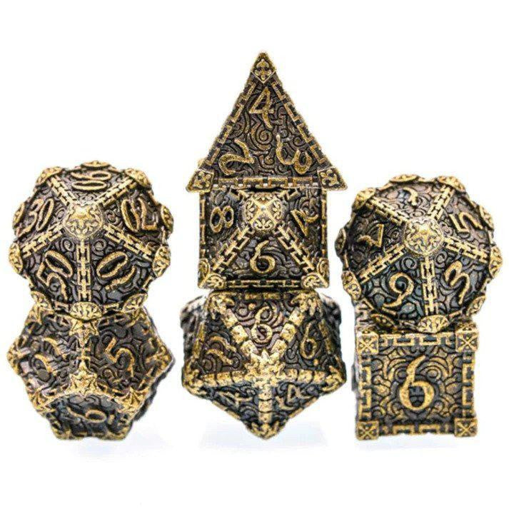 Three Dagger of Venom: Bronze RPG metal dice displayed in stacked arrangements.