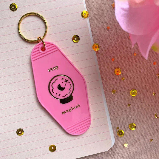 The Besties Hotel Keychain - Stay Magical Crystal Ball, pink acrylic keychain.