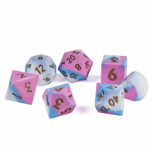 Chonky Bubblegum Oversize Silicone 7-piece dice set in pink, white, and blue with gold numbers.
