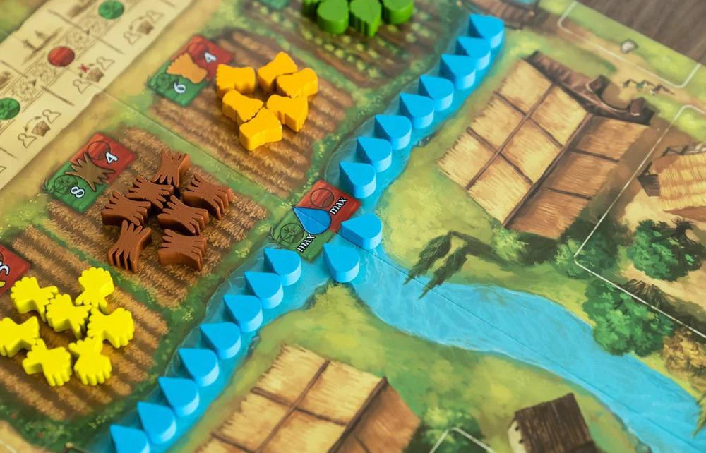 Beer & Bread resource management board game with wooden crops, animal, and water tokens.