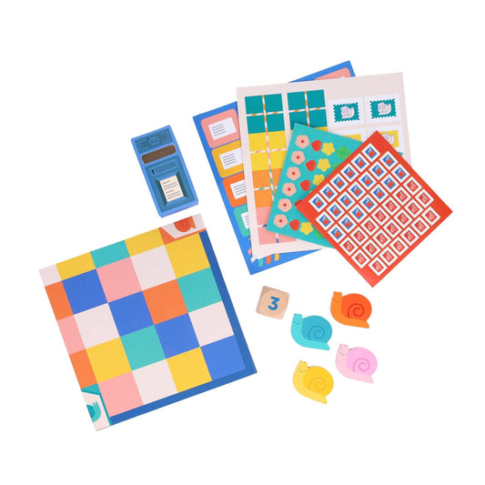 Snail Express board game with four colorful snail tokens on a checkered board.