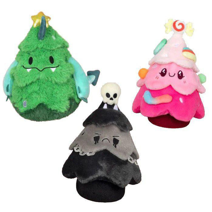 Alter Ego Christmas Trees in dragon-like green, candy pink, and black with skull variants.