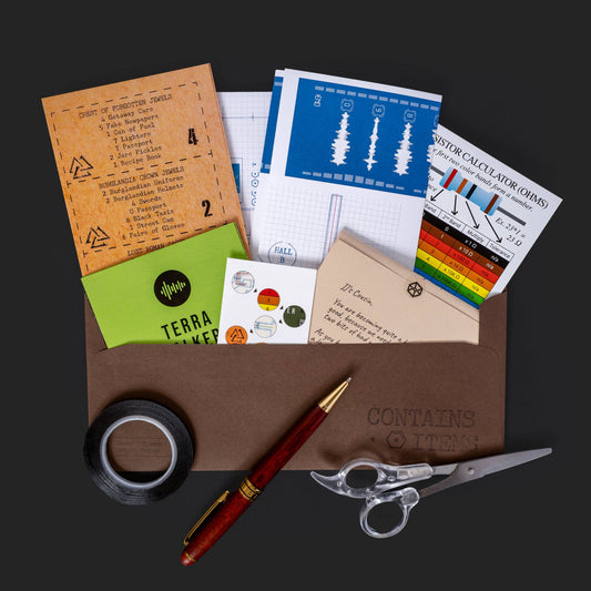 Family Secrets Series Episode 7 - Buried set with envelopes, stationery, blueprints, charts, cards, and diagrams.