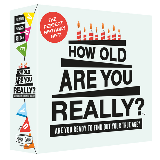 How Old Are You Really? party game with question cards and candles.