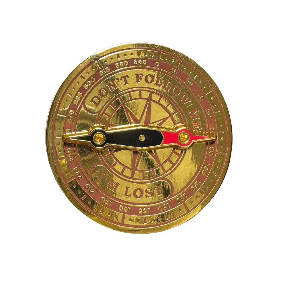 Deluxe Spinning Compass Pin: gold-toned enamel with spinning needle and engraved text Dont follow me Im lost.