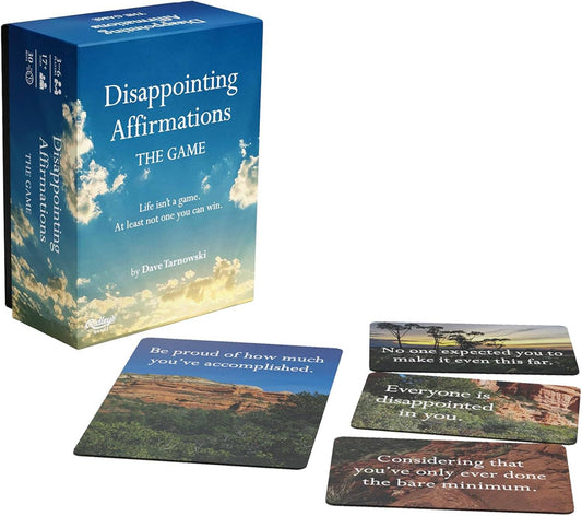 Disappointing Affirmations: The Disappointing Game, a card game featuring dark humor anti-positivity quotes.