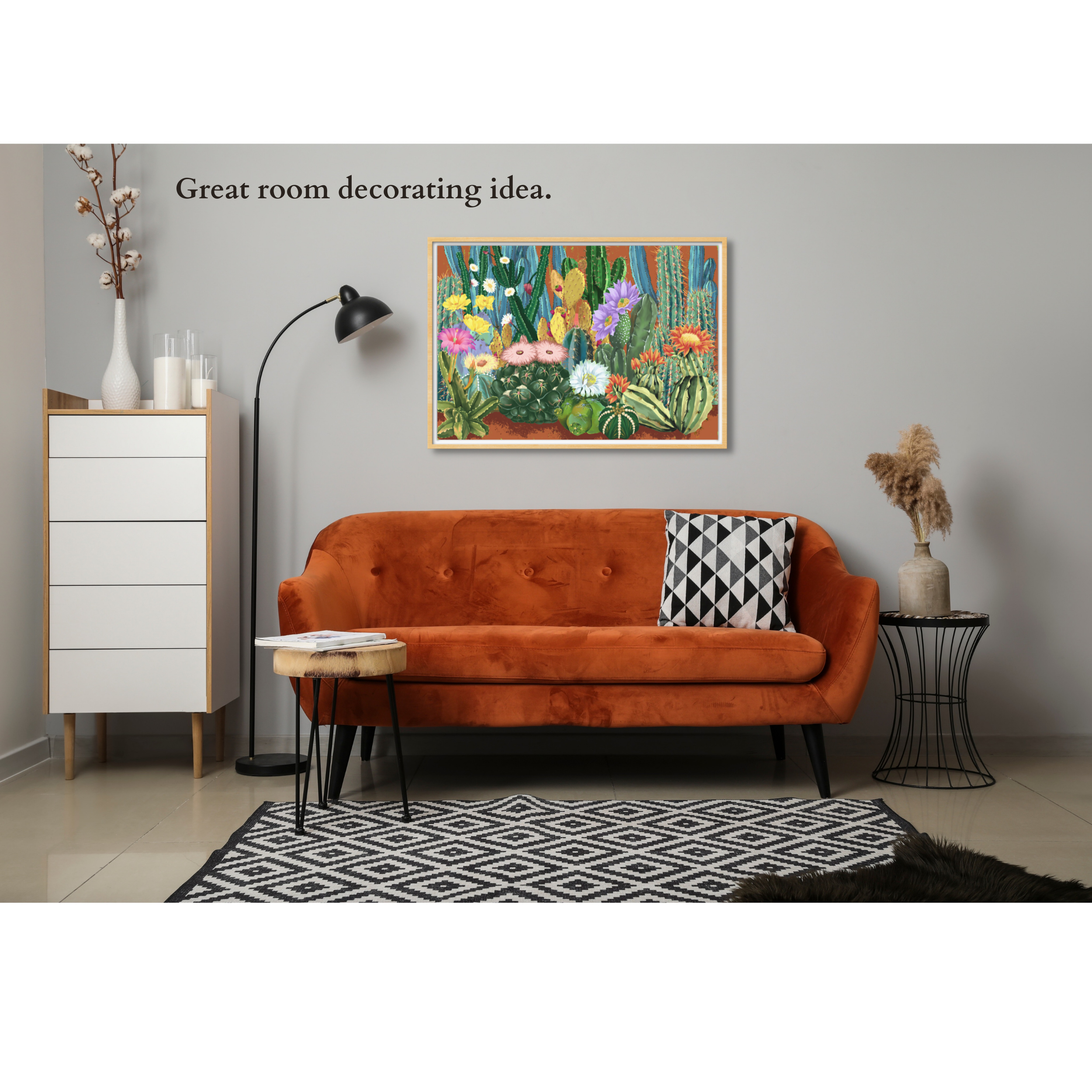 Whisper of Cactus“ puzzle art displayed above an orange sofa in a modern living room with a black-and-white rug.