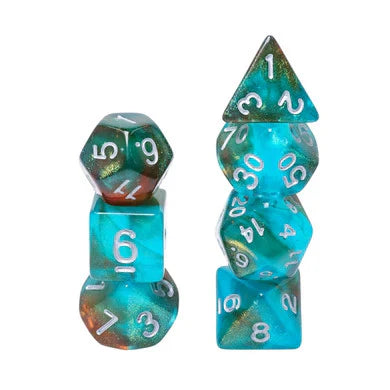 Glow in the Dark Blue Nebula RPG dice sets with white numbers for Pathfinder or D&D games, shown in two stacks.