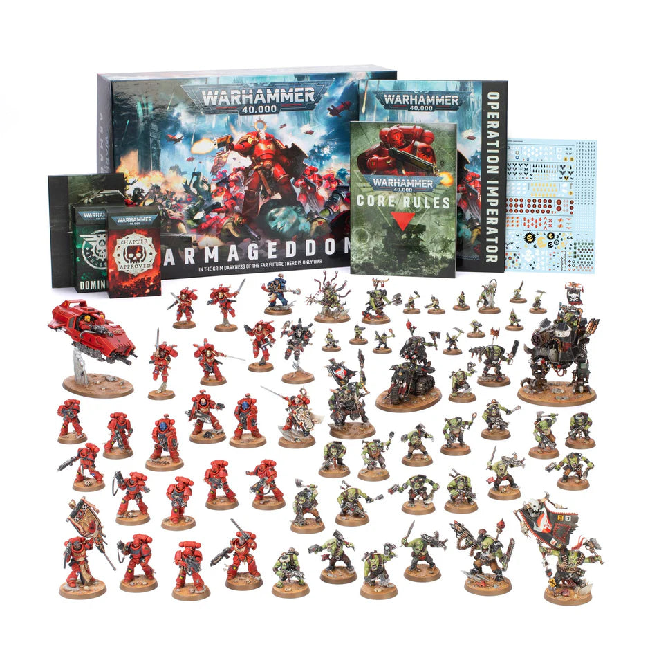 Warhammer 40,000 Armageddon 11th Edition Launch Box set with Orks, Blood Angels, rulebooks, dice, and stickers.