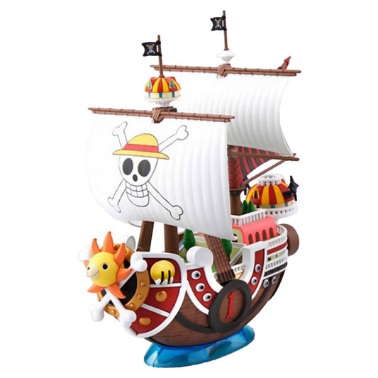 Thousand Sunny Grand Ship Collection model kit with white sails, skull flag, and lion figurehead.