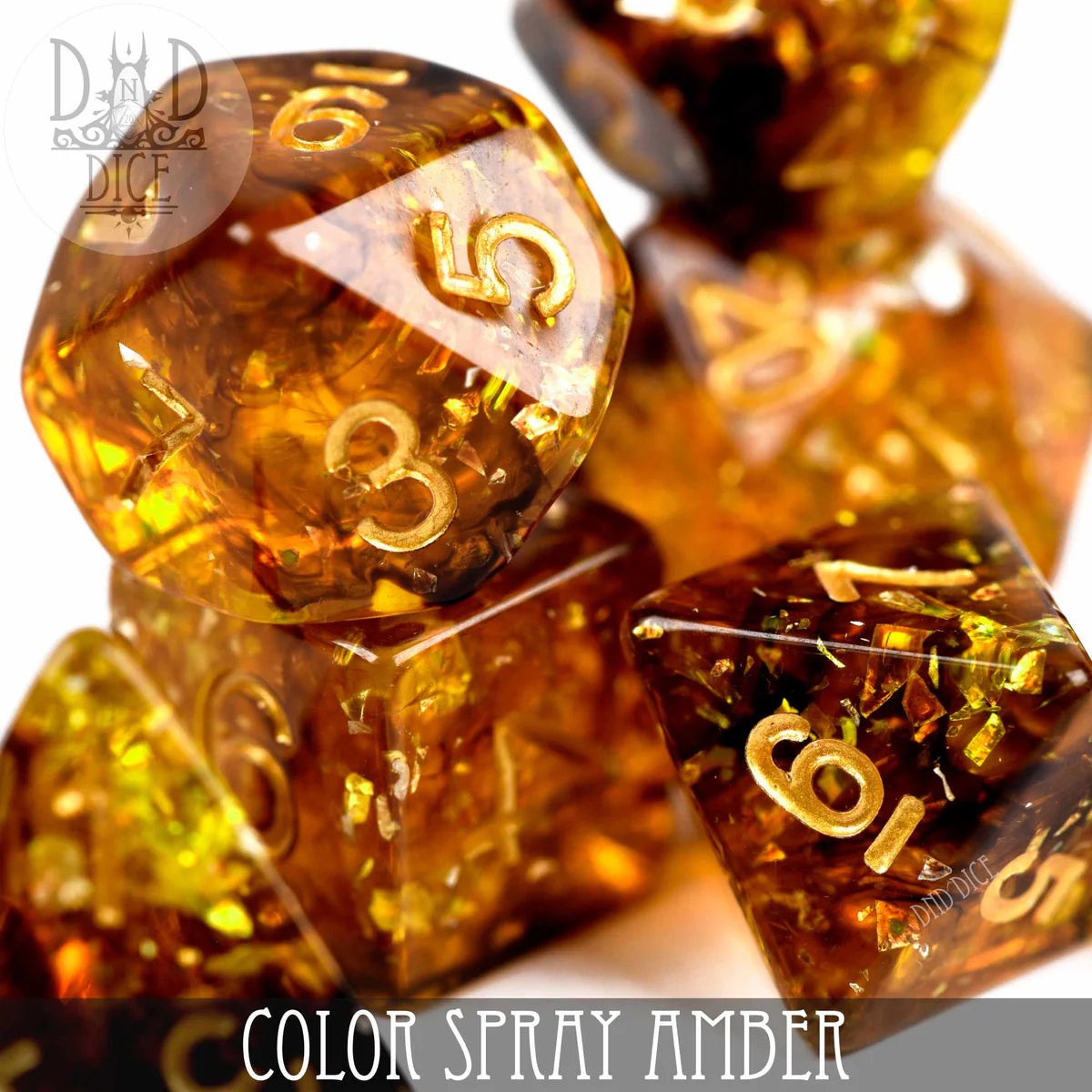 Color Spray Amber polyhedral dice set made of amber resin with gold numbers.