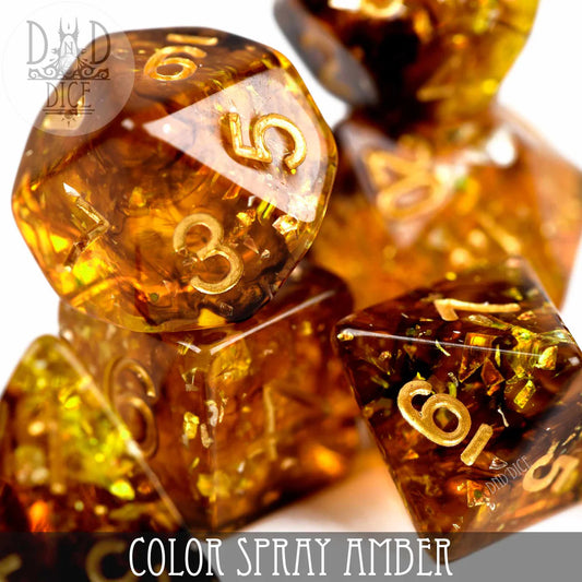 Color Spray Amber polyhedral dice set made of amber resin with gold numbers.