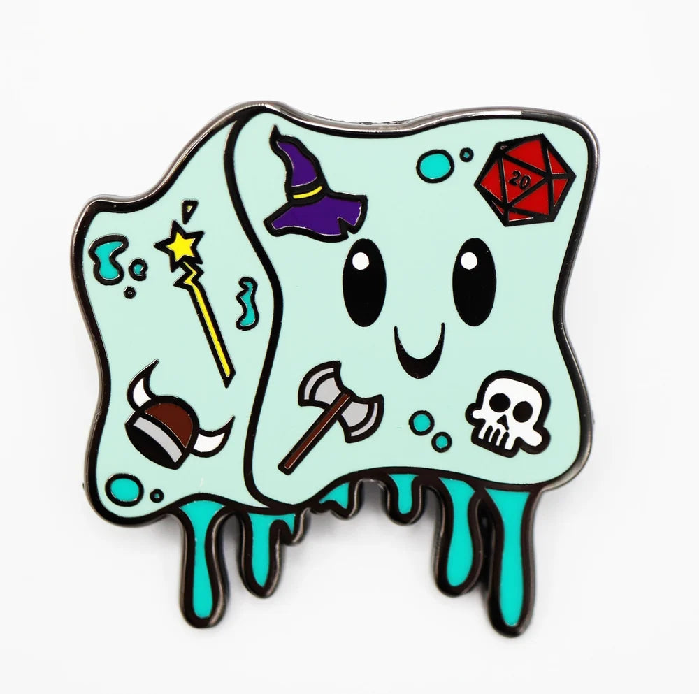 Monster Index Pin: Gelly Cube, blue pin with smiley face plus dice and viking helmet icons.