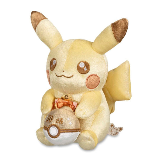 Pikachu 30th Celebration Plush holding a golden Poké Ball and wearing a festive bow.