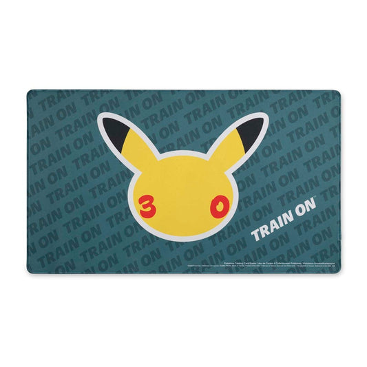 Pokémon TCG 30th Celebration Playmat with Pikachu’s head, “30” on cheeks, and TRAIN ON text in background.
