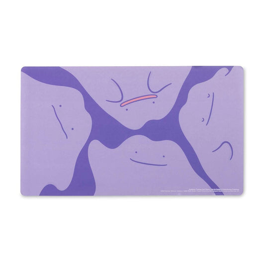 The Pokémon TCG: Ditto Quartet Playmat featuring abstract purple Ditto faces with smile or straight expressions.