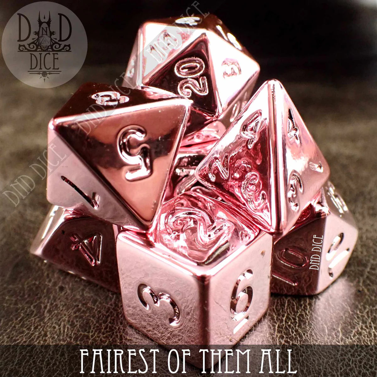 Shiny pink acrylic polyhedral 7-dice set, Fairest of Them All, stacked together.