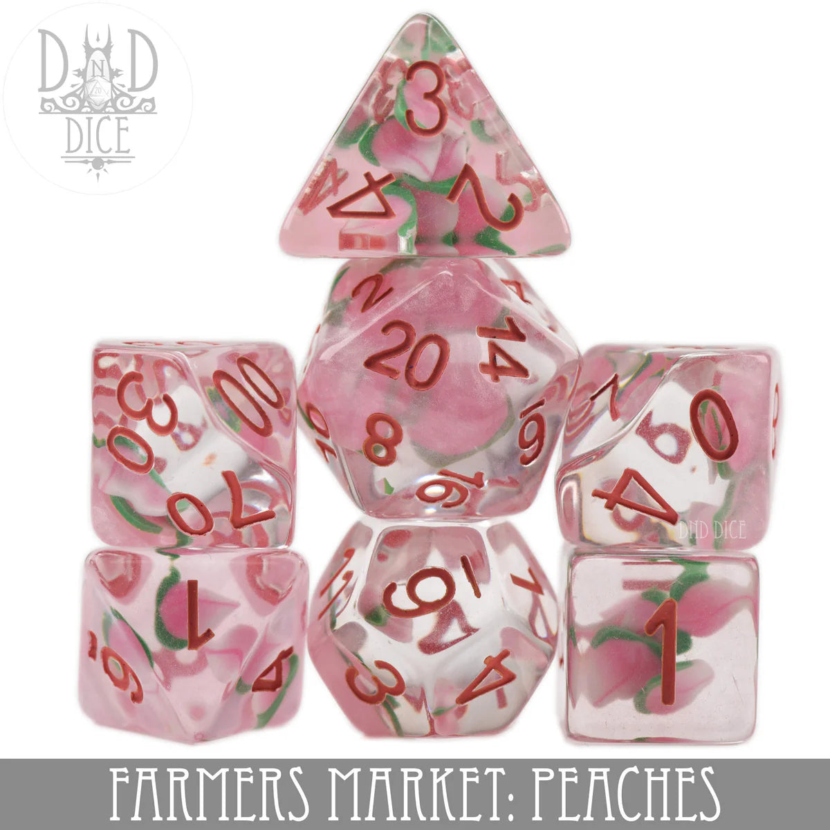 Farmers Market Dice: Peaches, clear 7-dice set with pink floral designs and red numbers for tabletop gaming.