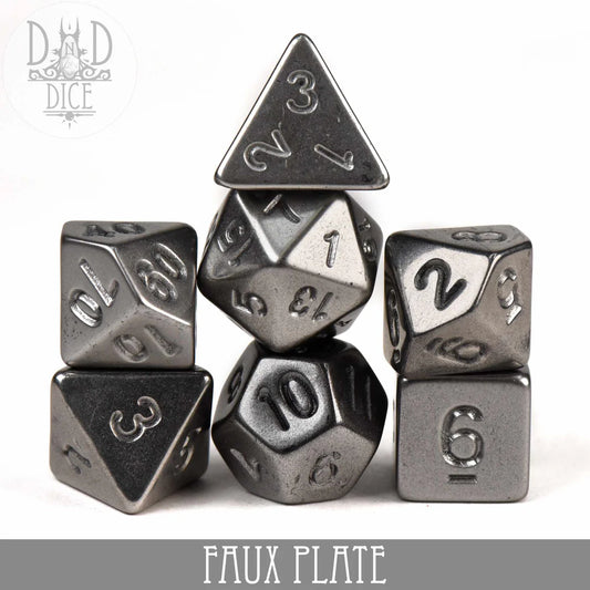 Six Faux Plate metallic dice with large engraved silver numbers and FAUX PLATE text.