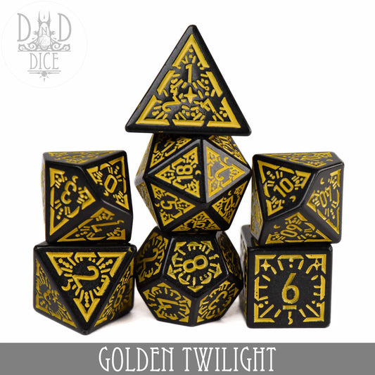 Golden Twilight 7-piece black and gold acrylic polyhedral dice set with engraved numbers, arranged in a pyramid.