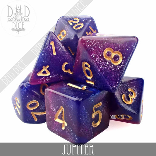 Jupiter Galaxy polyhedral dice set in purple and pink acrylic with gold numbers.