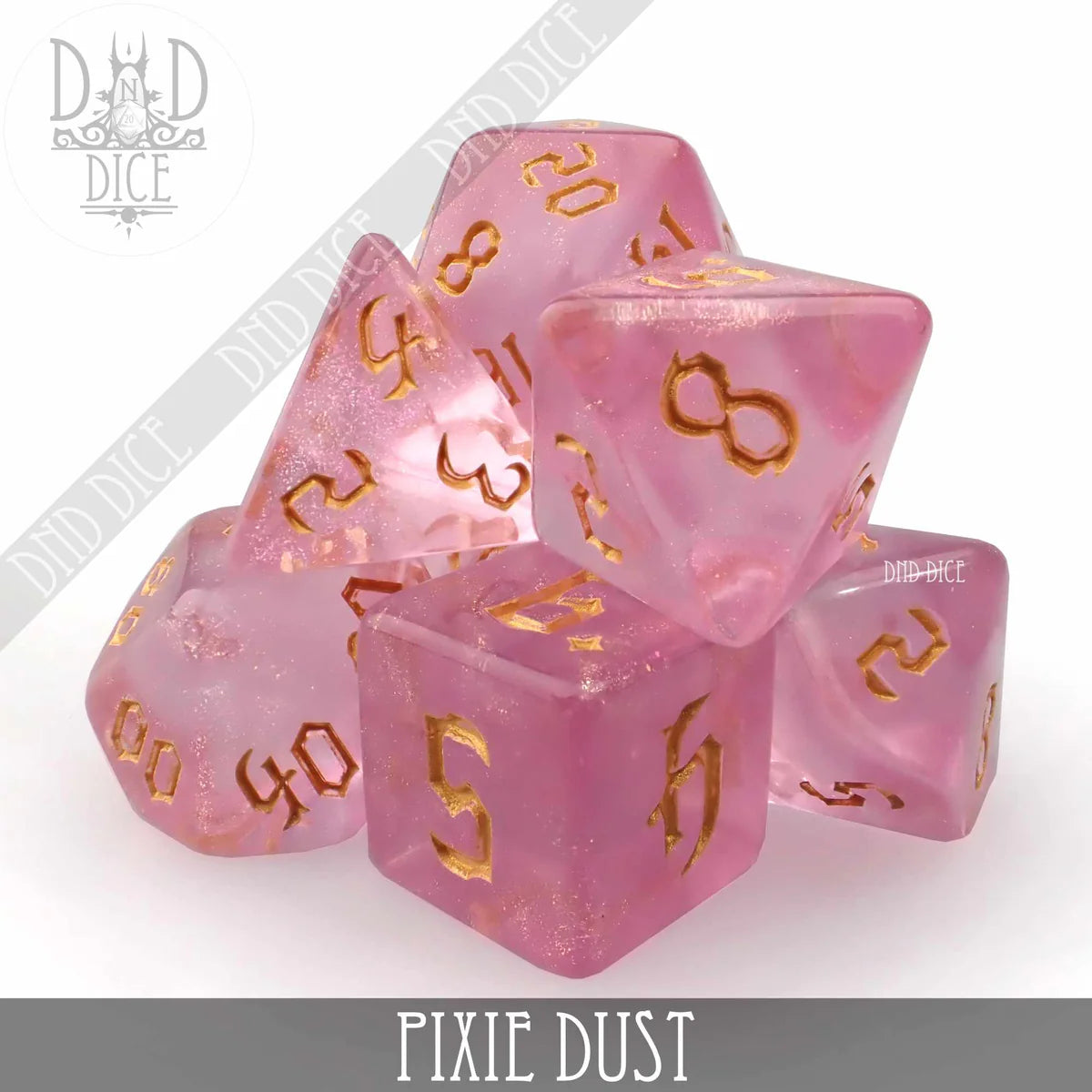 Translucent pink polyhedral dice set with gold numbers, Pixie Dust variant.