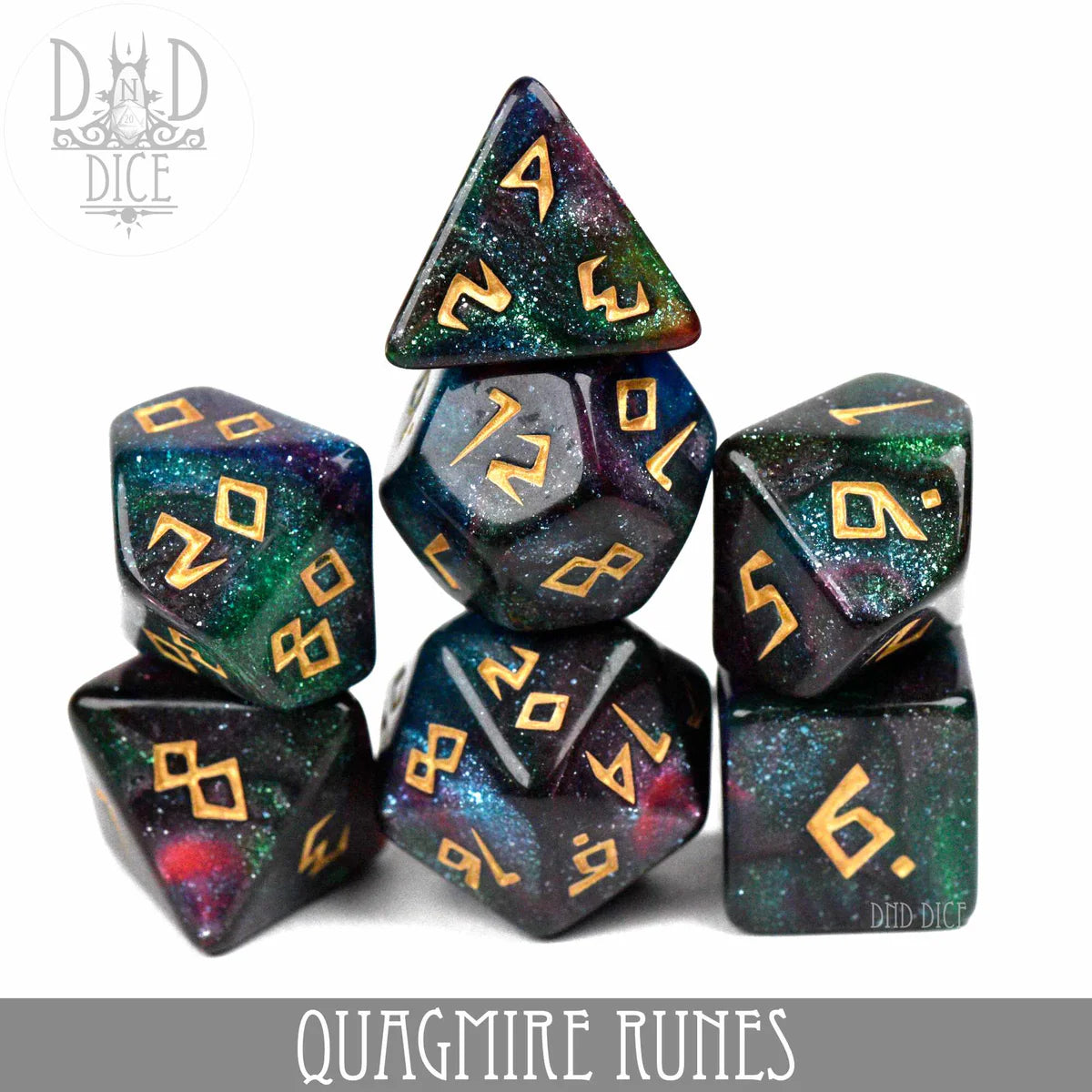Quagmire Runes acrylic polyhedral dice set with glittery galaxy theme and gold numbers.