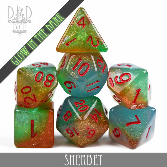 Sherbet Glow in the Dark resin RPG dice with multicolored glitter and red numbers, glow in the dark.