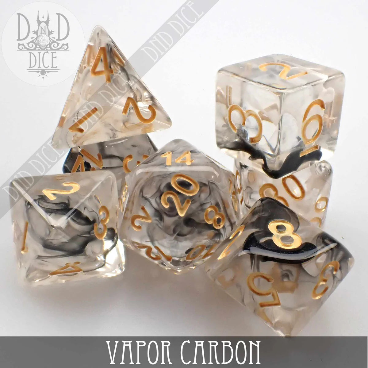 Vapor Carbon 7-dice set made of swirling black and clear resin with gold numbers.